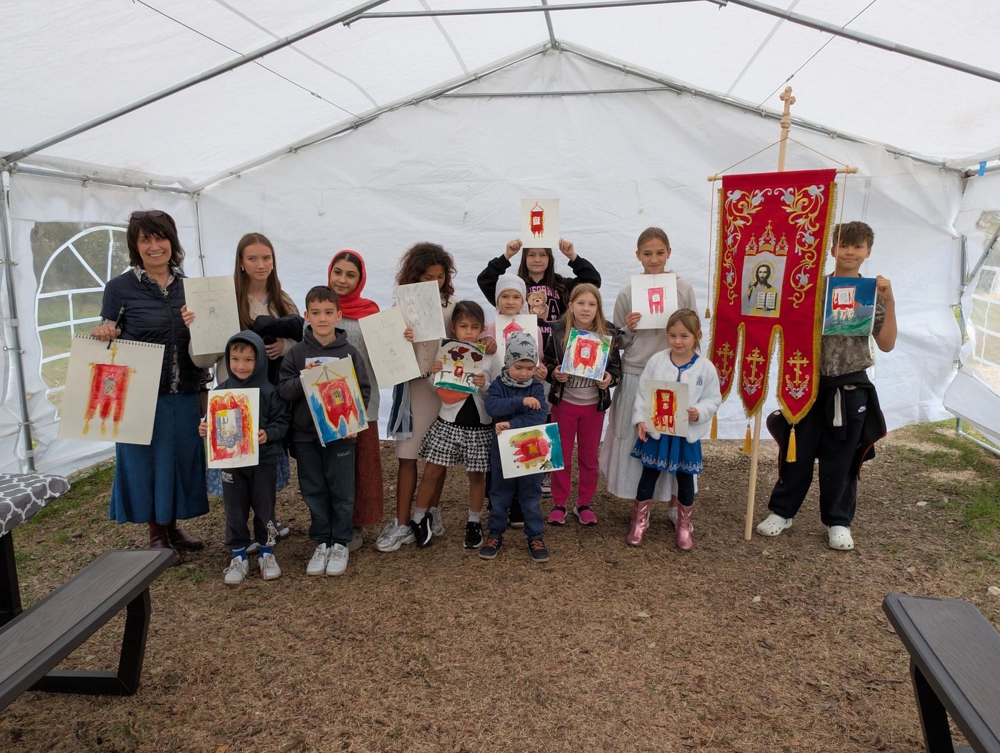 Parish community gathering — Sunday school children with artwork